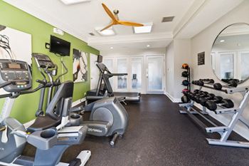The gym at the preserve at polk apartments
